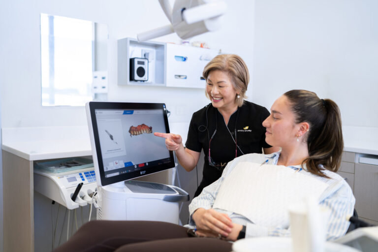 cosmetic dentist in adelaide consulting patient